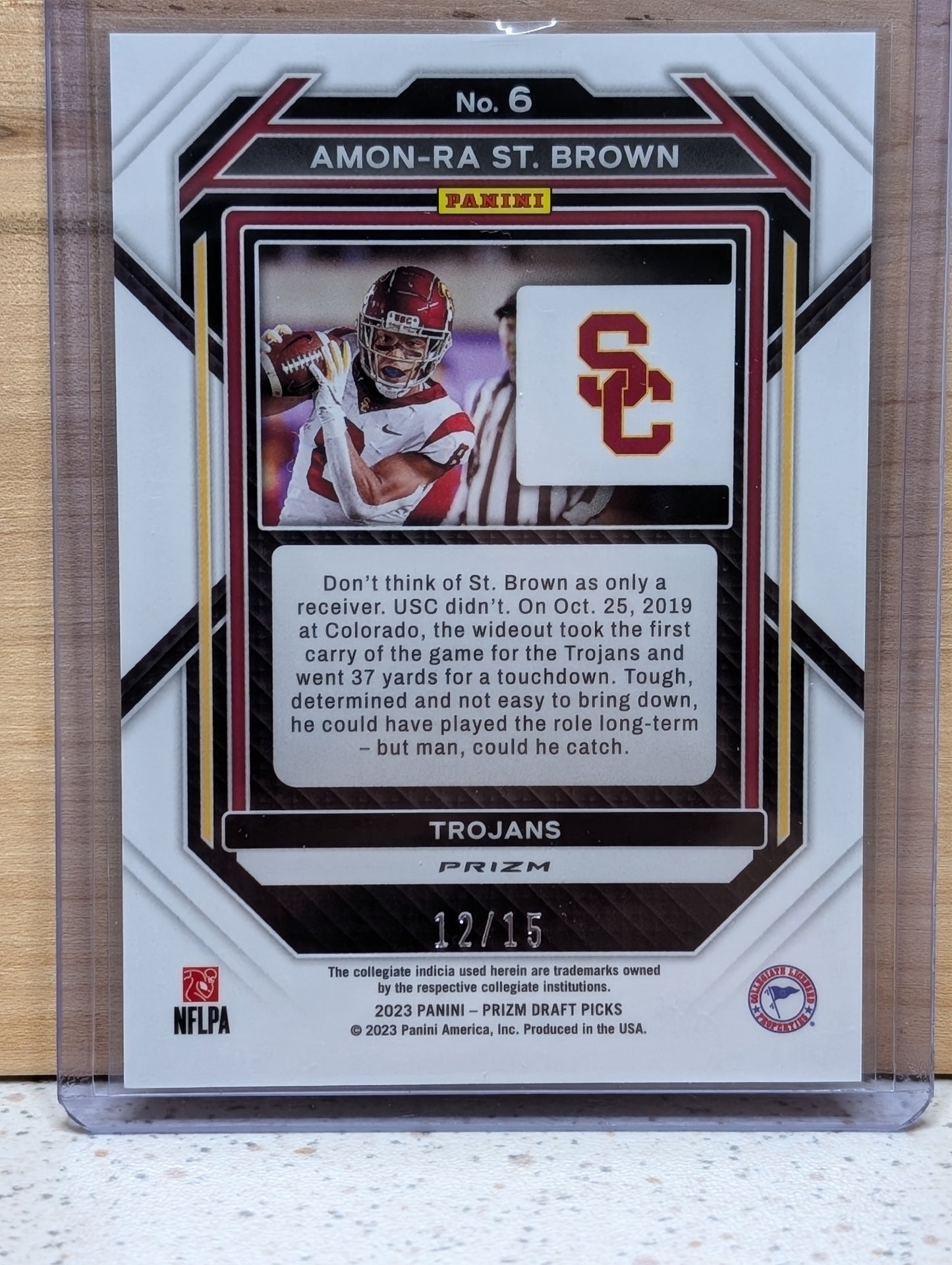 2023 Panini Prizm Draft Picks Neon Pink Pulsar /15 #6 Amon-Ra St. Brown